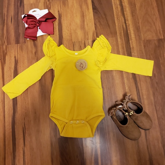 mustard yellow onesie